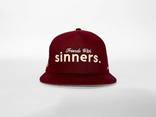 the sinners cabernet cap